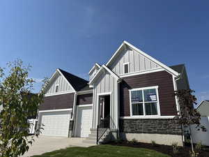 View of front of property featuring a garage