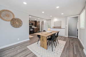 Dining room with wood-type flooring