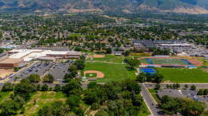 Birds eye view of property featuring a mountain view