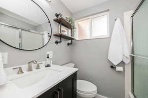 Bathroom with toilet and vanity