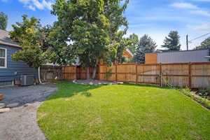 View of yard featuring cooling unit