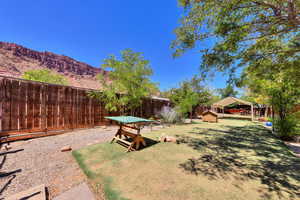 View of yard featuring a mountain view and a carport