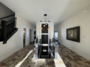 Interior space with dark tile patterned flooring