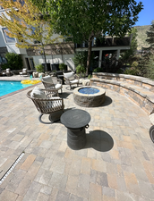 View of patio featuring an outdoor fire pit