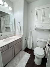 Bathroom with toilet and vanity