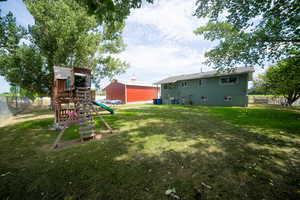 View of yard featuring a playground