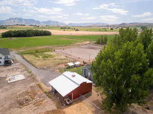 Drone / aerial view with a mountain view and a rural view