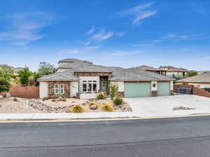 Prairie-style home featuring a garage