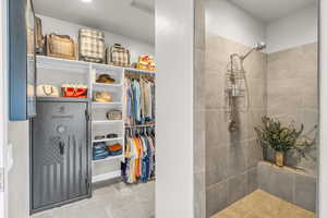 Bathroom with a tile shower