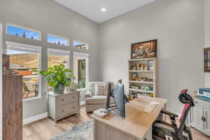 Home office featuring light wood-type flooring