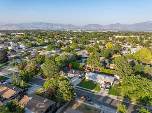 Birds eye view of property with a mountain view