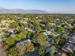 Birds eye view of property with a mountain view