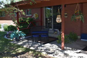 Doorway to property with a patio