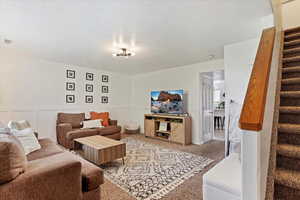 Living room with carpet floors