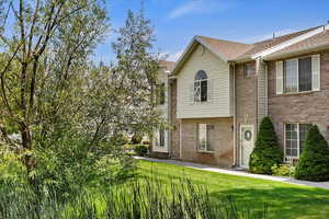 Exterior space featuring a yard