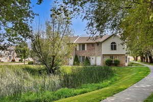 View of front of house with a front yard