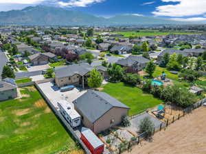 Birds eye view of property with a mountain view