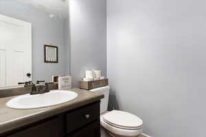 Bathroom with vanity and toilet