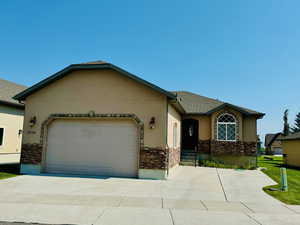 Home with a garage on paved road