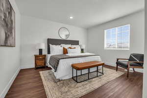 Bedroom featuring dark hardwood / wood-style floors