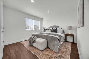 Bedroom featuring dark hardwood / wood-style flooring