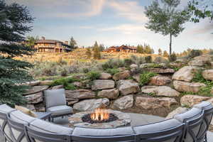 View of patio / terrace featuring a fire pit