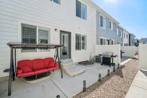 Rear view of house with a patio area