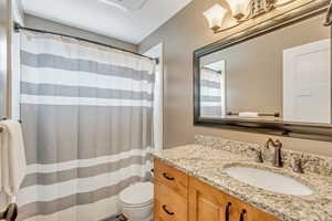 Bathroom with toilet and vanity