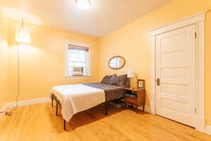 Bedroom featuring hardwood floors