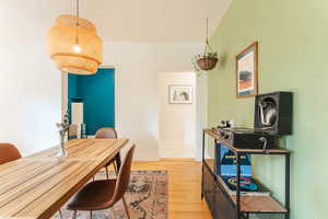 Dining room with hardwood flooring