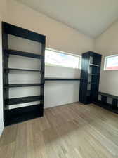 Walk in closet featuring light wood-type flooring