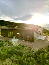 Rear view of house featuring a patio area