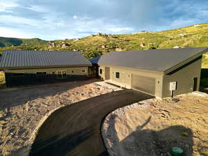 View of front of home with a mountain view