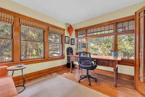 Office space featuring light hardwood / wood-style flooring and plenty of natural light