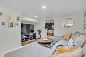 Living room with light hardwood / wood-style flooring