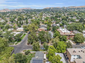 Birds eye view of property featuring a mountain view