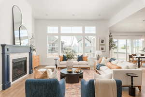 Living room with light wood-type flooring