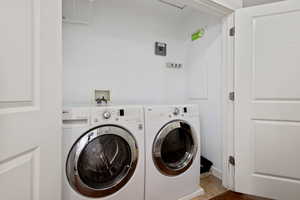 Front loading washer and dryer included.