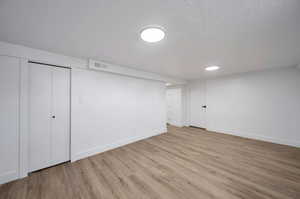 Unfurnished bedroom featuring light hardwood / wood-style flooring