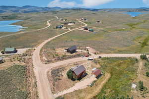 Bird's eye view featuring a rural view and a water and mountain view