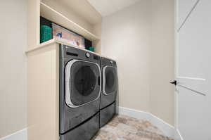 Large wash machine/dryer for easy function located on the main level.