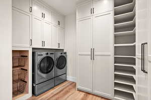 This master closet features a full washer/dryer to make life a little more functional and and effentent.