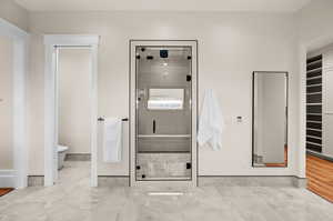 Master Bathroom large steam shower, featuring body sprays, rain shower, and a warm body dryer.