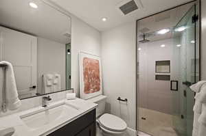 This bathroom is conveniently located right by the exercising room and the shower is a steam shower!