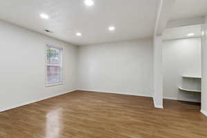 Empty room with light wood-type flooring