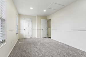 Unfurnished bedroom featuring carpet flooring