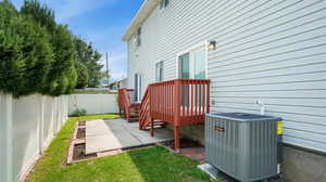 View of yard with cooling unit