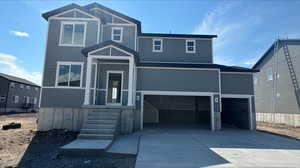 View of front of home with a garage