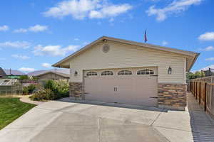 View of front of property with a garage