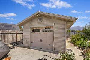 Garage featuring a mountain view